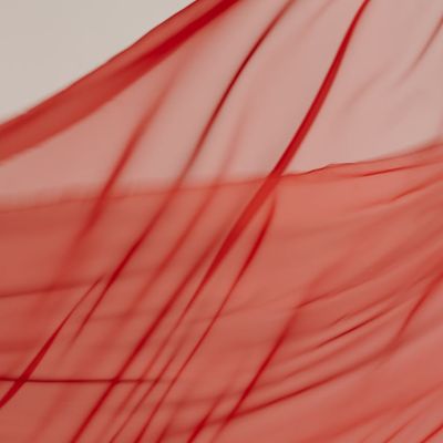 Abstract soft fabric texture suggesting gentle movement.