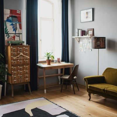 Sunlight streaming through a window onto a wooden floor.